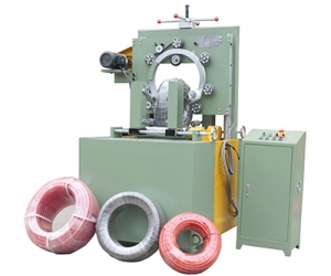 Hose coil packing machine