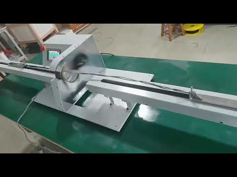 Taping wrapping machine with pull wire WPM-303K