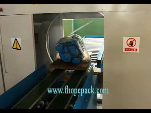 horizontal stretch wrapper for motor packing on tray