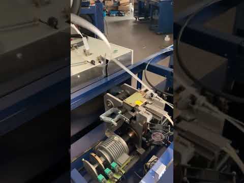 Battery operated pallet strapping machine