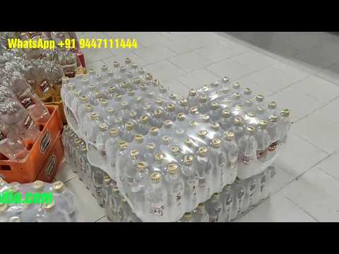 Shrink wrapping machine for Bottles, Soda , Mineral water, Fruit Juice Bottle group packing Machine