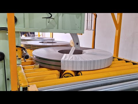 Automatic steel coil packaging line (incudes strapping, wrapping, printing and stacking)
