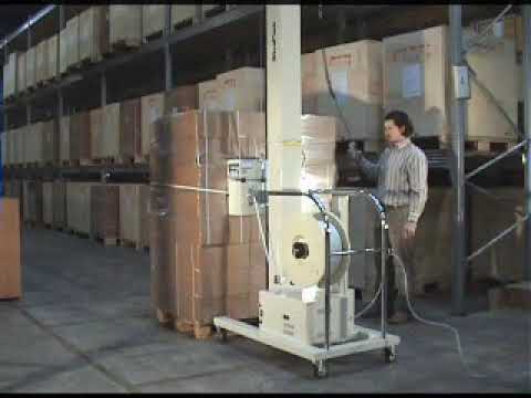 Pallet strapping machine with automatic operation.