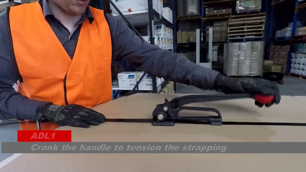 Using a manual steel strapping tensioner: step-by-step guide.
