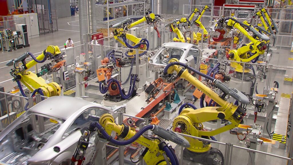 “Efficient Industrial Robots Revolutionize Audi’s Manufacturing Process”